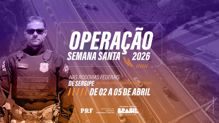 Viatura e agente da PRF em rodovia federal durante operação em São Paulo