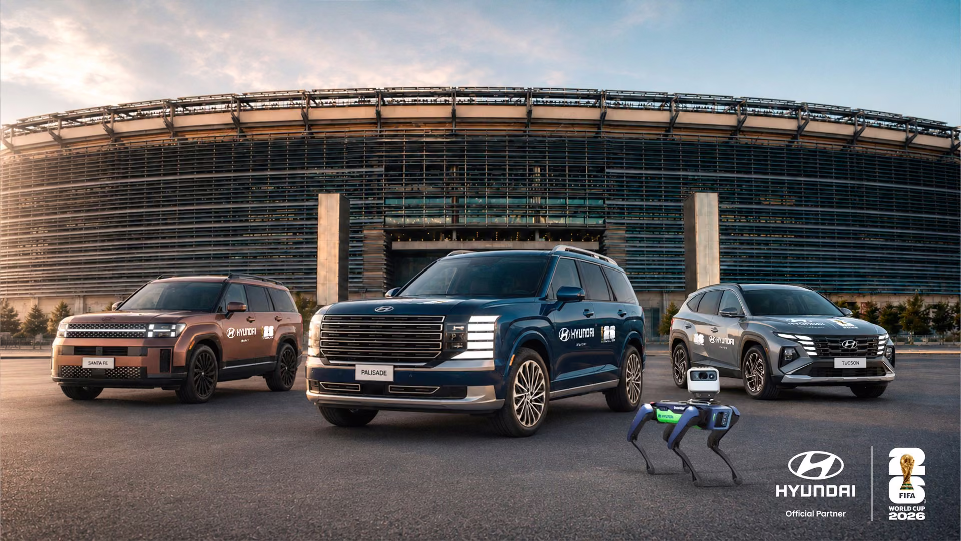 Hyundai Palisade, Santa Fe, Tucson e robô Spot diante de estádio da Copa do Mundo 2026